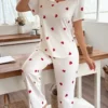 dream adore طقم بلوزة نوم نسائية أكمام قصيرة بطبعة قلب وشورت 13