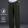 بنطلون رجالي كاجوال بخصر مرن وجيوب مائلة، قماش خفيف الوزن وبلون أحادي 5