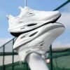أحذية الجري ماراثون ذات الألواح الكربونية أحذية رياضية خفيفة الوزن وماصة للصدمات، مانعة للانزلاق وماصة للصدمات/بنعل مطاطي، تصميم زر دوار، سهلة الارتداء والخلع، تصميم منخفض التهوية، مناسبة للماراثون والجيم والتدريب، جميع الفصول 11
