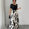shein elenzya فستان نسائي بياقة على شكل حرف v وخصر مشدود بتصميم خطوط أبيض وأسود مجرد، مزين بإبزيم معدني، أنيق للاستخدام اليومي، العطلات، النمط الفرنسي الرجعي، التنقل، عيد الحب، المواعدة، الملابس الشارعية، الحفلات، أوائل الربيع/الربيع الصيف 9