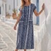 shein lune فستان نسائي بياقة مستديرة وأكمام قصيرة بخفقان الخفيفة مع طباعة هندسية لإجازة 11