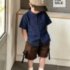 shein genkimix kids قميص كاجوال أحادي الصدر بأكمام قصيرة، لون سادة، للأولاد الصغار عمر 4 سنوات 13