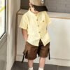 shein genkimix kids قميص كاجوال أحادي الصدر بأكمام قصيرة، لون سادة، للأولاد الصغار عمر 4 سنوات 11