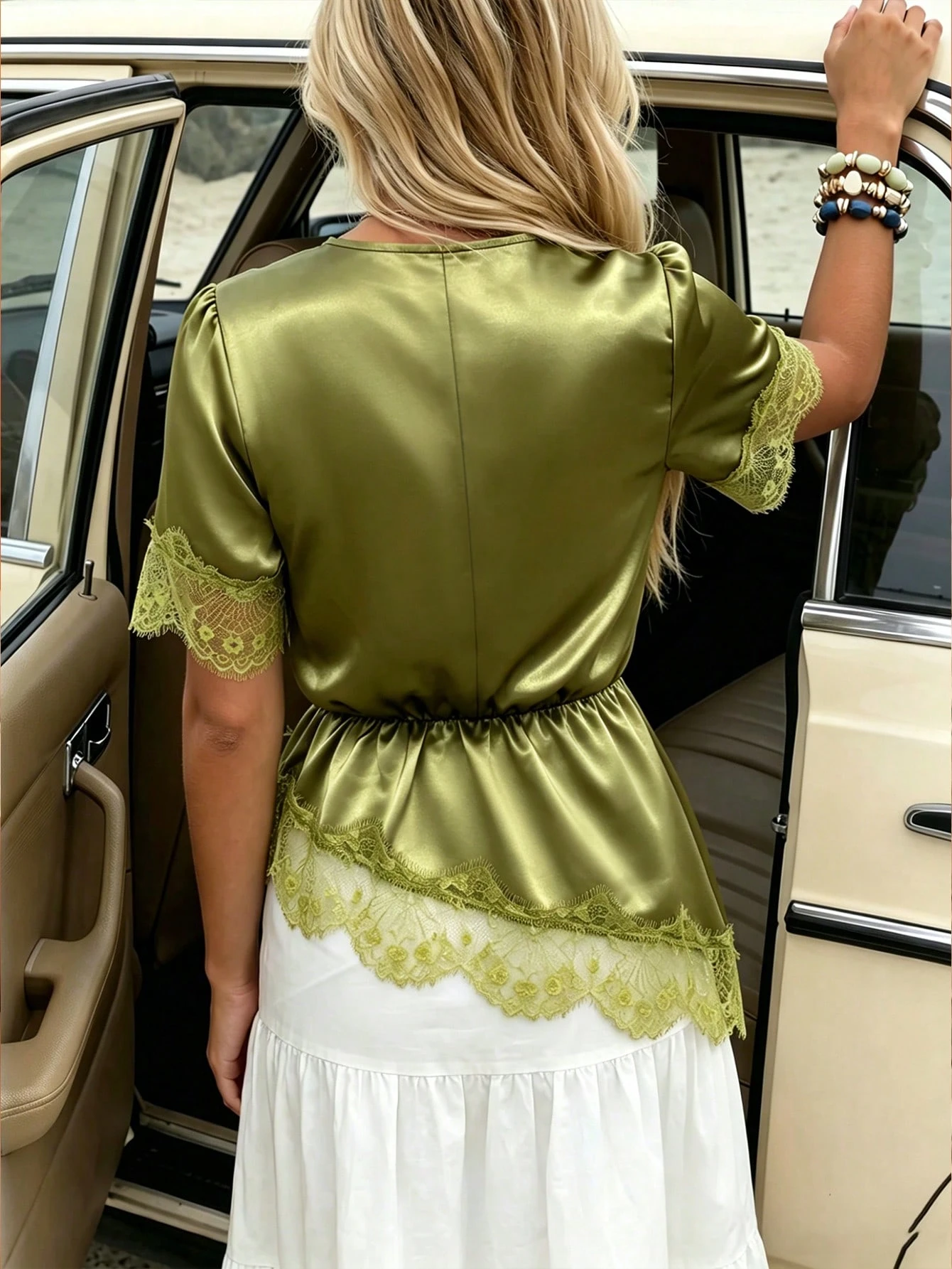 flora isola flora isola بلوزة نسائية كاجوال لعطلات الربيع/الصيف بياقة على شكل حرف v وتفاصيل دانتيل متباينة وحافة غير متماثلة بلون موحد وأكمام قصيرة 2