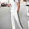 manfinity homme طقم تي شيرت وبنطلون للرجال مطبوع بحروف وأشكال هندسية 1