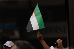 pexels photo 24446589 24446589 Close-up of a hand holding a Palestinian flag during protest in Rabat, Morocco.
